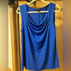 Sleeveless vivid blue top. Size XL